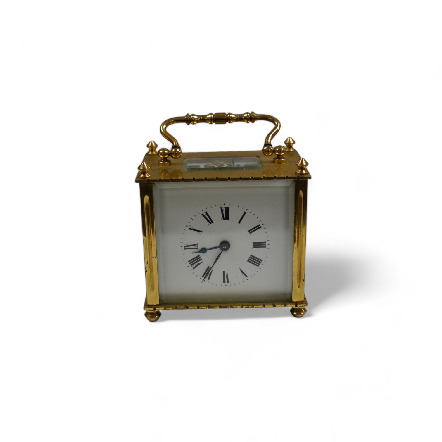 A small French brass cased eight day carriage timepiece, 9cm tall. Condition - fair to good, not tested